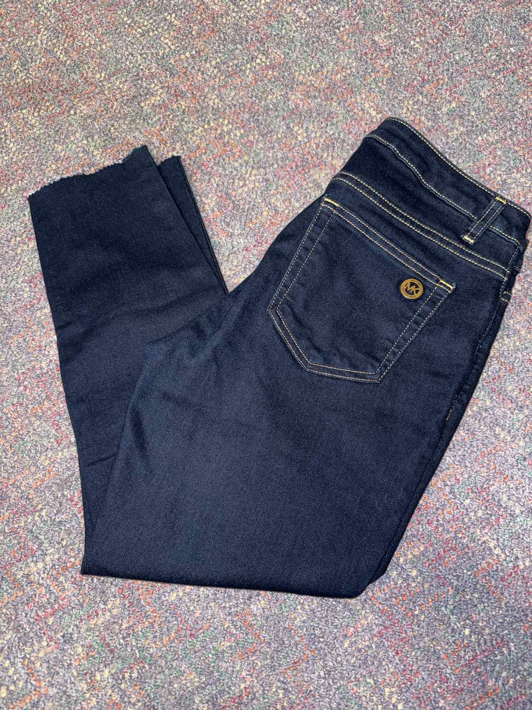 6 - Michael Kors Capri