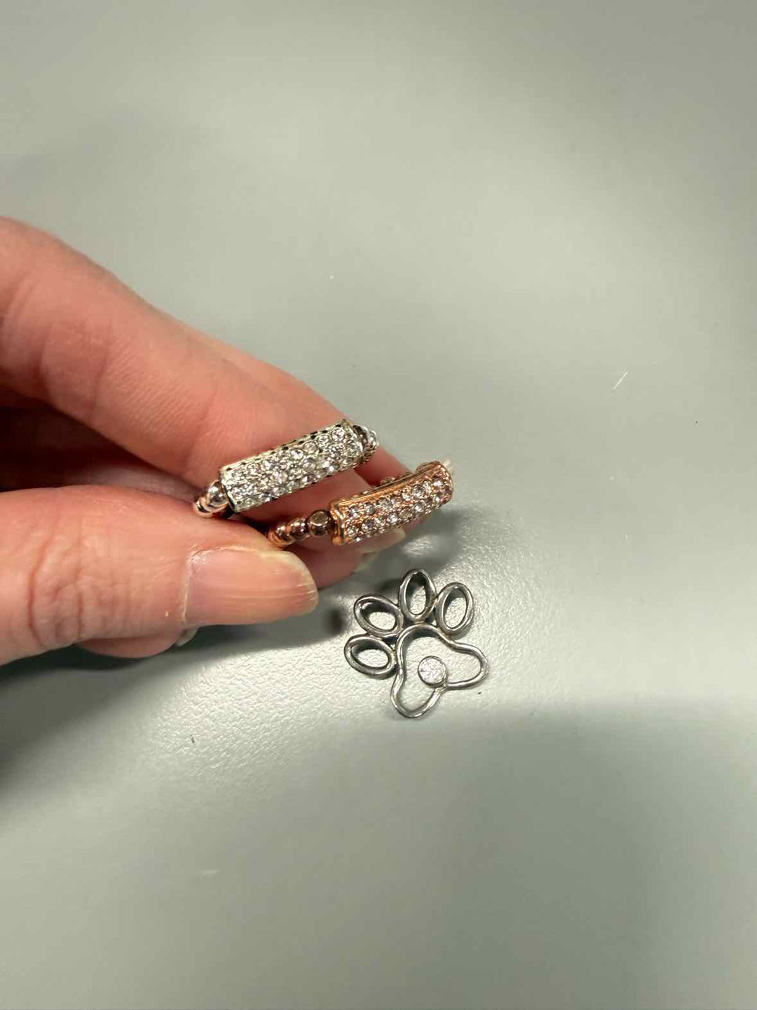 Jewelry - 2 stretchy rings & a paw pendant