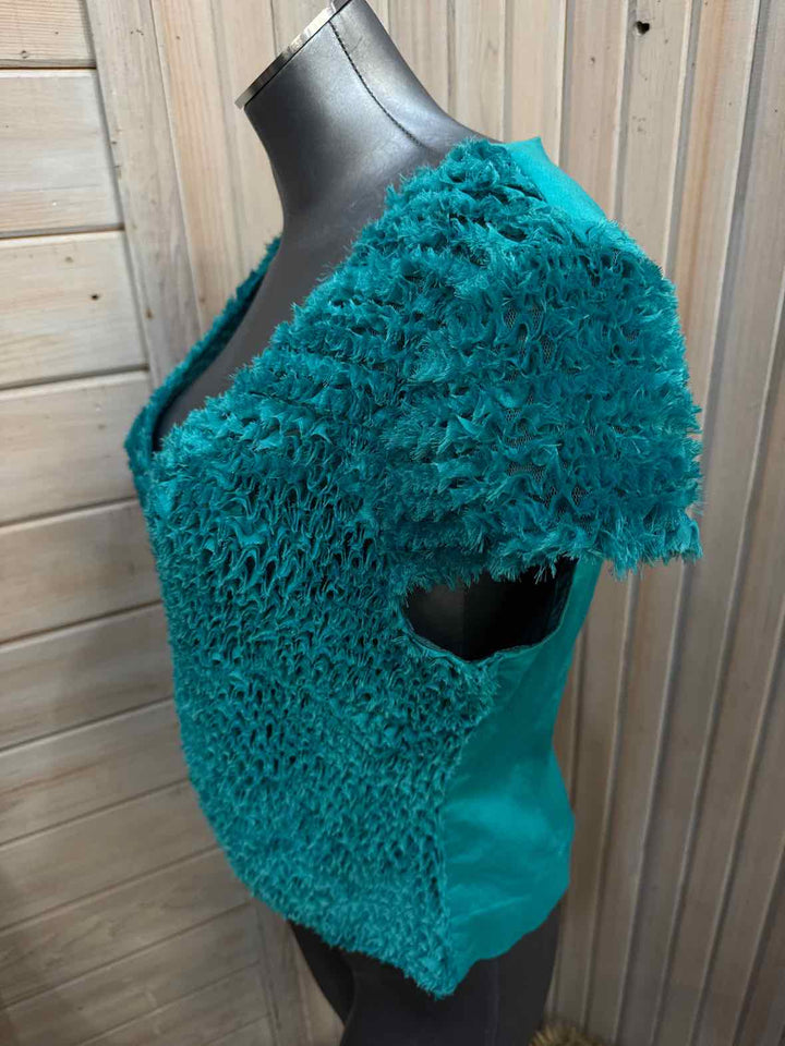 L - T. Bleu Vest