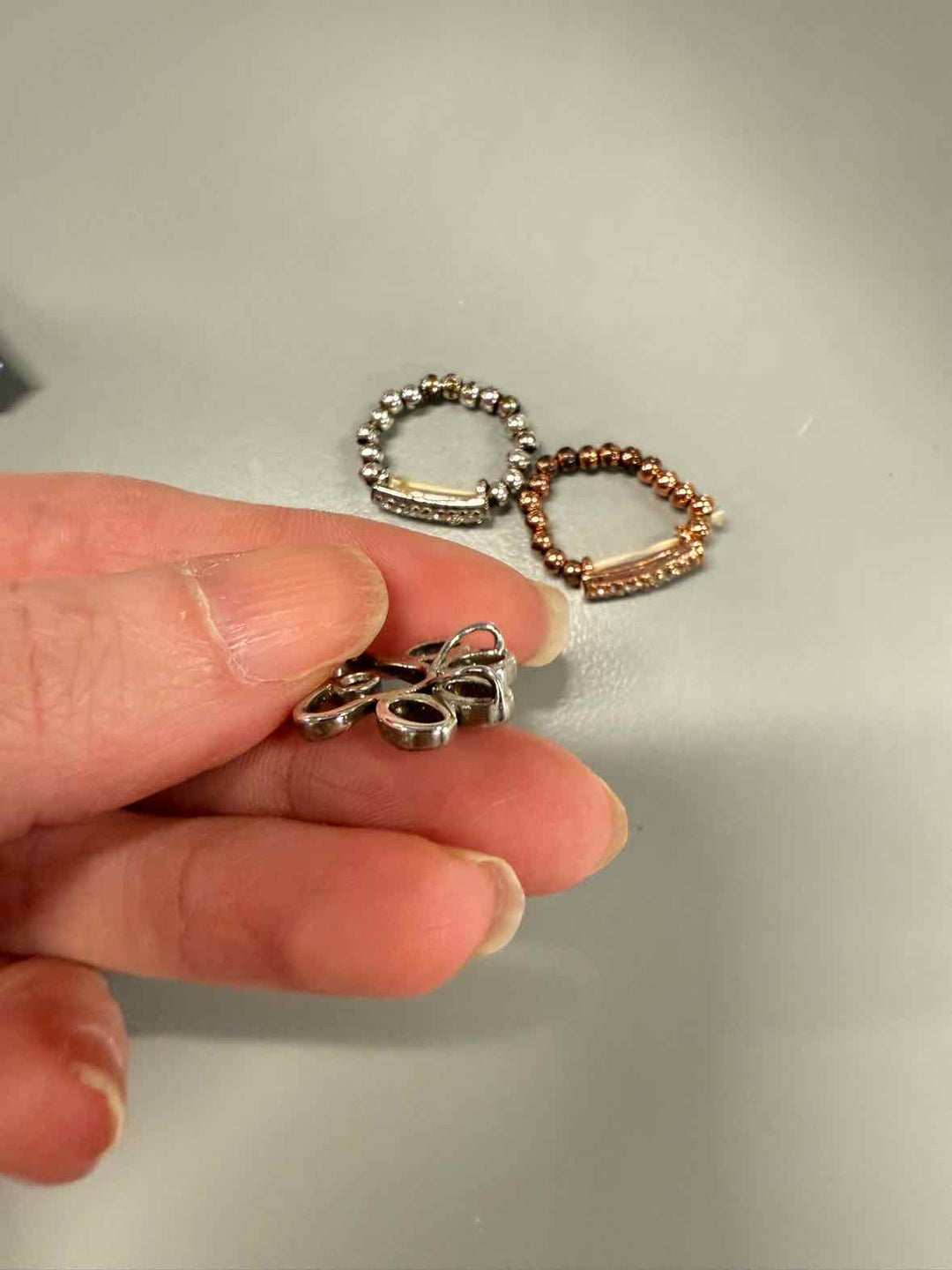Jewelry - 2 stretchy rings & a paw pendant