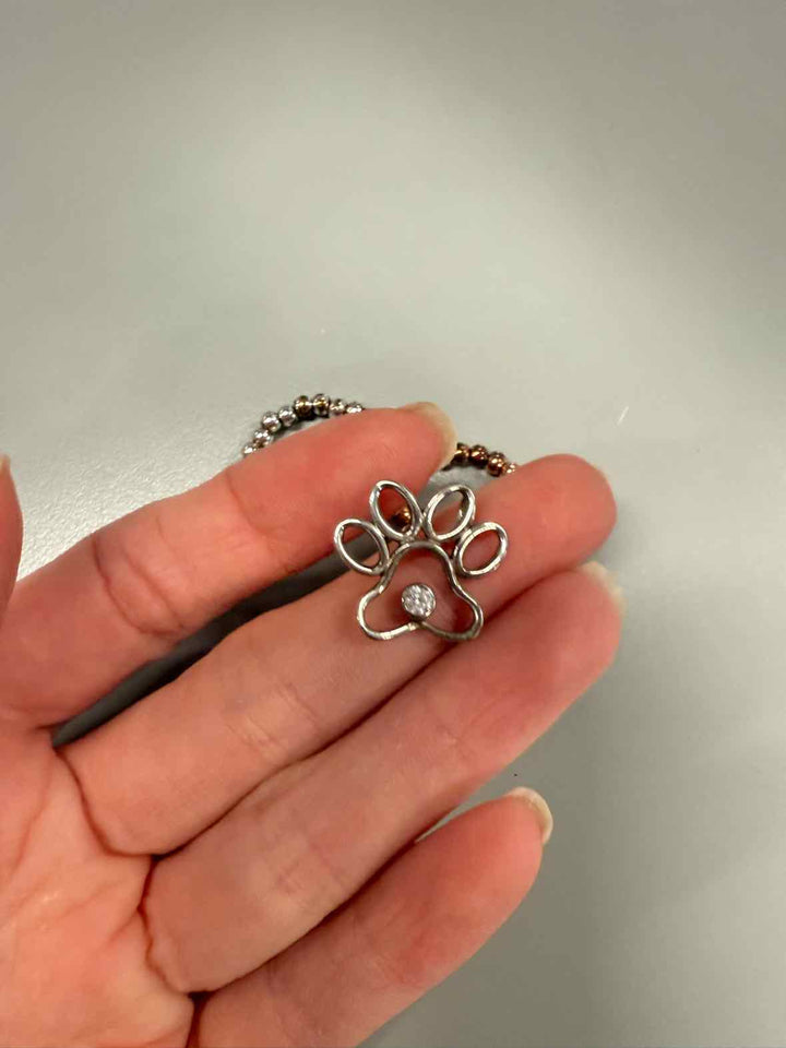 Jewelry - 2 stretchy rings & a paw pendant
